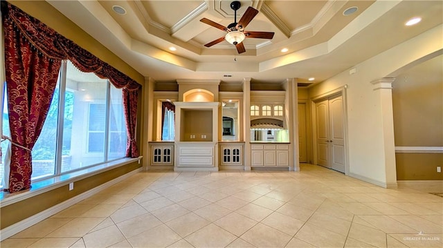 spare room with light tile patterned floors, decorative columns, baseboards, a ceiling fan, and crown molding