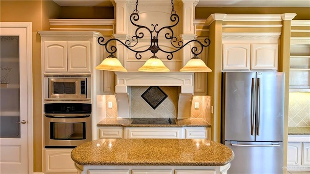 kitchen featuring stainless steel appliances, pendant lighting, decorative backsplash, and light stone counters