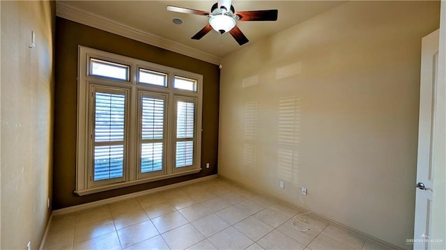 doorway to outside featuring ceiling fan, light tile patterned floors, ornamental molding, and baseboards