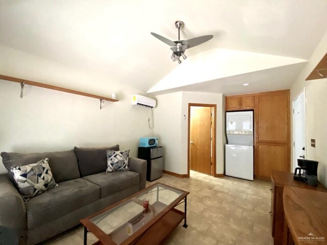 4014 Lark Dr, Mission, TX 78572 - living area with stacked washer / drying machine, a wall mounted AC, a ceiling fan, and vaulted ceiling