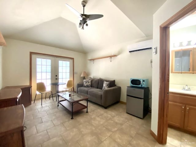 4014 Lark Dr, Mission, TX 78572 - living room featuring a wall mounted AC, a ceiling fan, lofted ceiling, and french doors