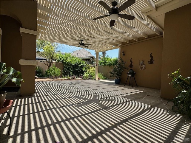 view of patio / terrace featuring a pergola and ceiling fan