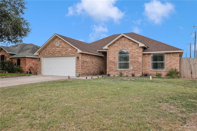 3621 Xenops Ave, Mcallen, TX 78504 - ranch-style house with fence, an attached garage, brick siding, a front yard, and concrete driveway