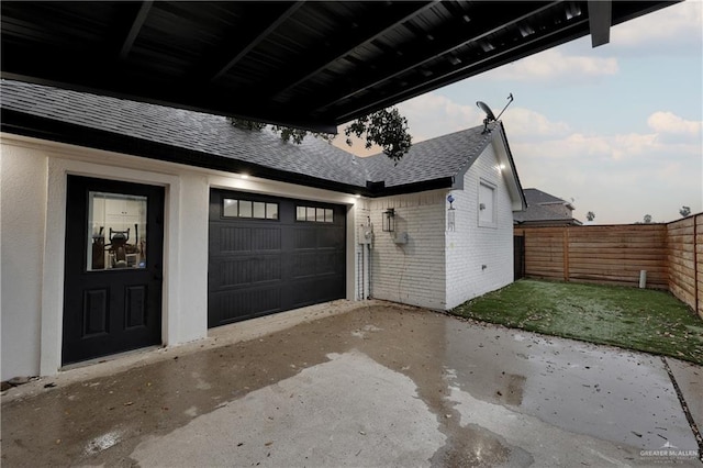 garage with a lawn