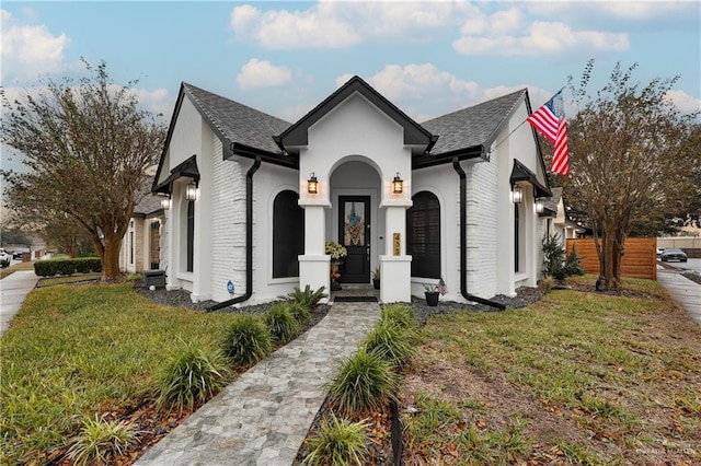 view of front of property with a front lawn