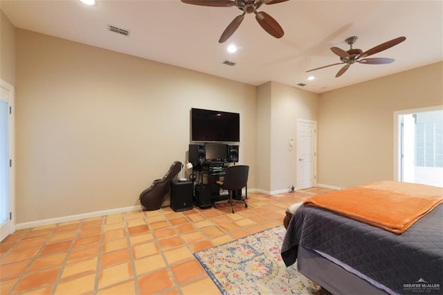 tiled bedroom with ceiling fan