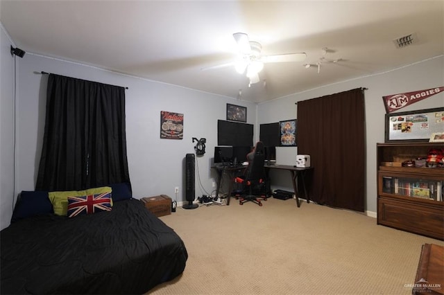 carpeted bedroom with ceiling fan