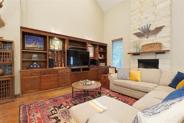 living room featuring tile patterned flooring, a fireplace, and high vaulted ceiling