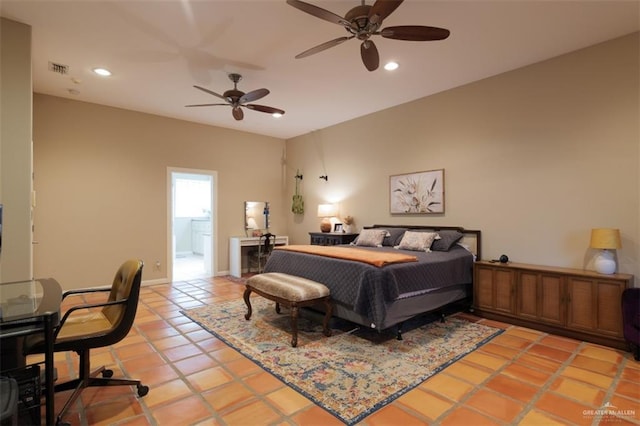 tiled bedroom with connected bathroom and ceiling fan