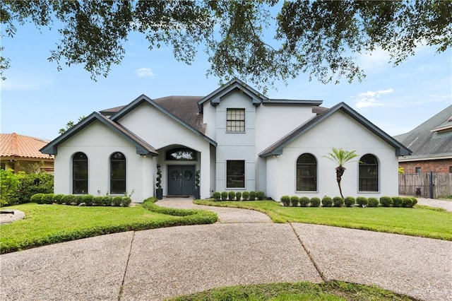 view of front of home with a front lawn