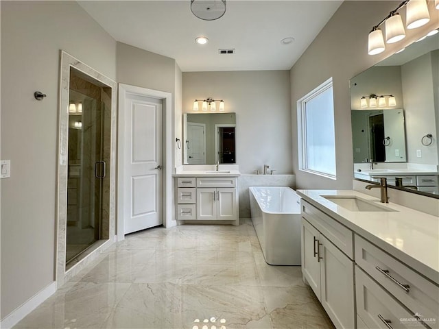 bathroom featuring plus walk in shower and vanity