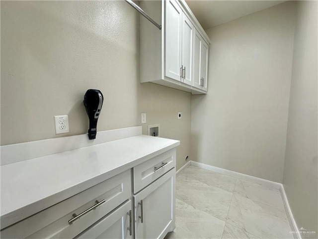 laundry room with electric dryer hookup, cabinets, and washer hookup