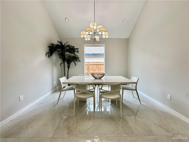 unfurnished dining area with a notable chandelier and vaulted ceiling