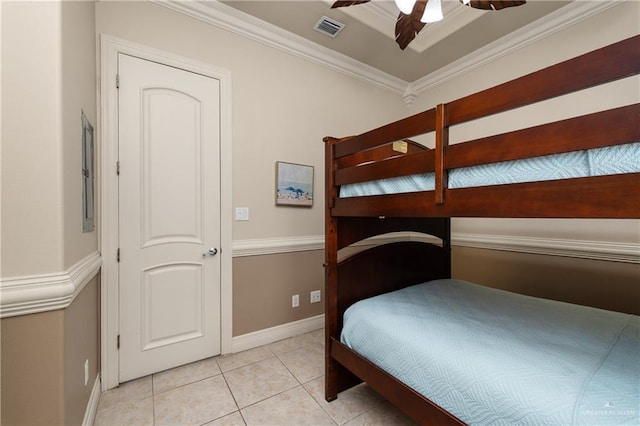 123 E Saturn Ln Unit C-3, South Padre Island, TX 78597 - bedroom with crown molding and light tile patterned flooring