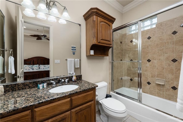 123 E Saturn Ln Unit C-3, South Padre Island, TX 78597 - ensuite bathroom featuring ornamental molding, enclosed tub / shower combo, vanity, and ceiling fan