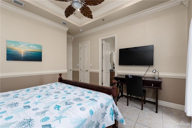 123 E Saturn Ln Unit C-3, South Padre Island, TX 78597 - bedroom featuring a tray ceiling, crown molding, light tile patterned floors, and a ceiling fan