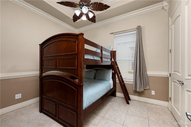 123 E Saturn Ln Unit C-3, South Padre Island, TX 78597 - bedroom featuring light tile patterned floors, ornamental molding, a raised ceiling, and ceiling fan