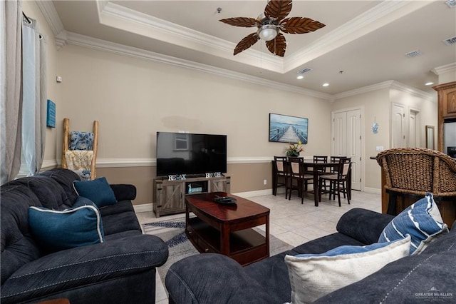 123 E Saturn Ln Unit C-3, South Padre Island, TX 78597 - living room featuring a raised ceiling, ceiling fan, crown molding, light tile patterned floors, and recessed lighting