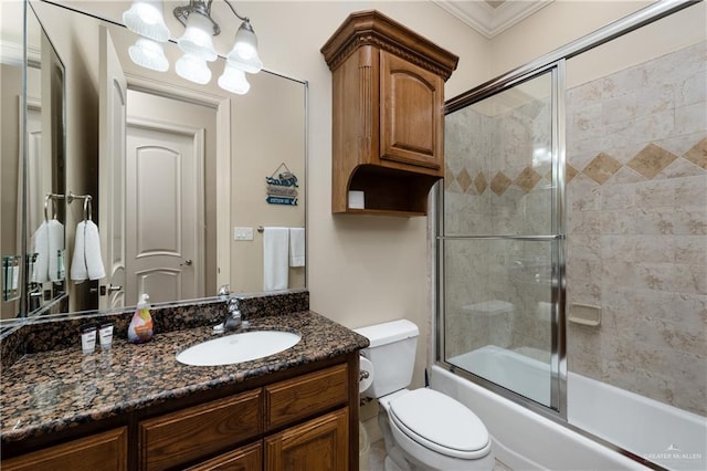 123 E Saturn Ln Unit C-3, South Padre Island, TX 78597 - bathroom with vanity, combined bath / shower with glass door, a chandelier, and crown molding