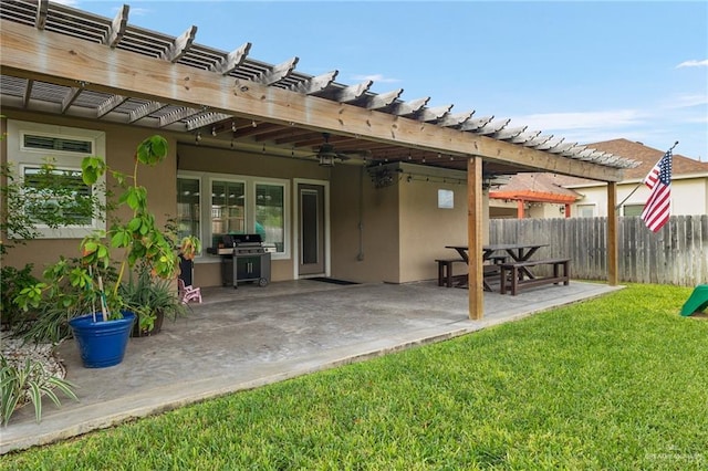 view of patio / terrace with a pergola and area for grilling