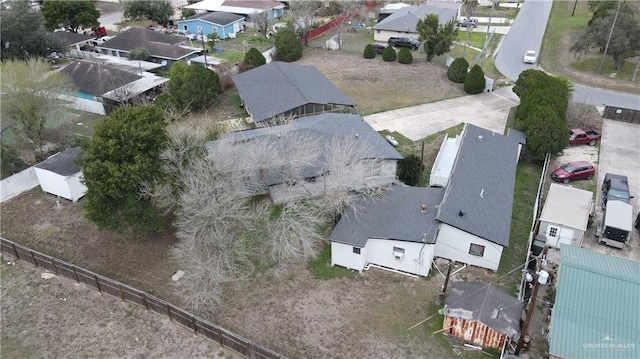 birds eye view of property with a residential view