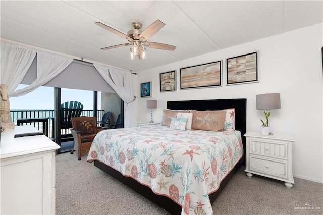 3000 Gulf Blvd Unit 701, South Padre Island, TX 78597 - bedroom featuring light carpet, access to exterior, and ceiling fan
