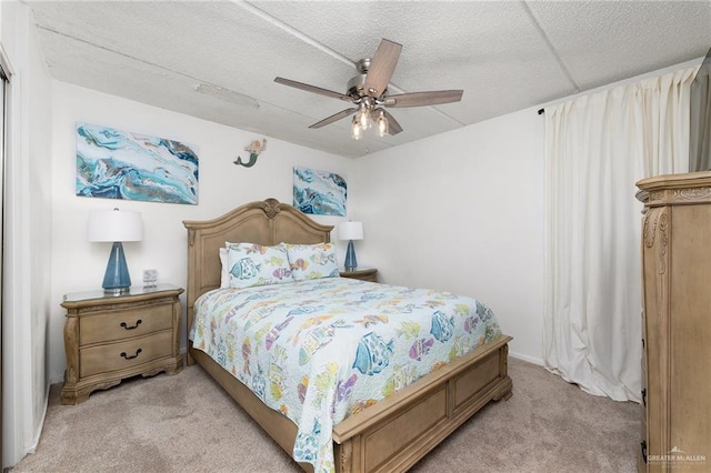 3000 Gulf Blvd Unit 701, South Padre Island, TX 78597 - bedroom featuring light carpet and a ceiling fan