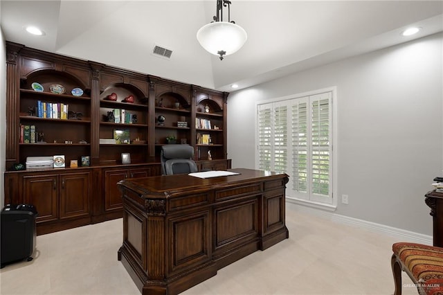 office space with vaulted ceiling