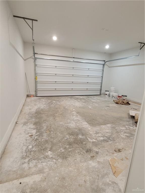 garage featuring baseboards