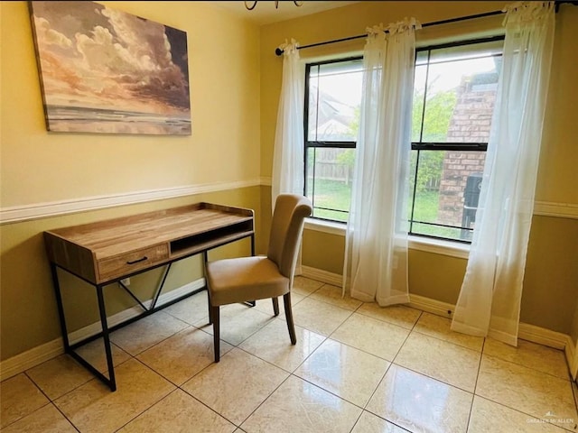 tiled home office with a wealth of natural light