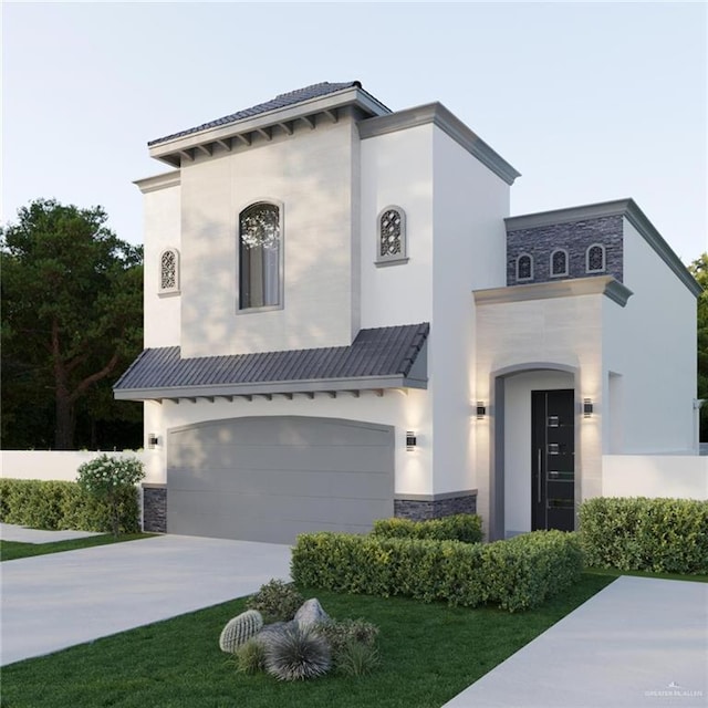 mediterranean / spanish home featuring a garage