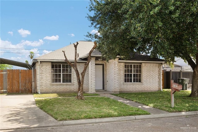 view of front facade with a front lawn