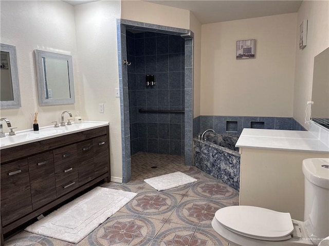 full bathroom with tile patterned floors, vanity, separate shower and tub, and toilet