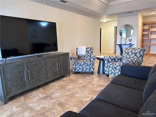 living room featuring light tile patterned flooring