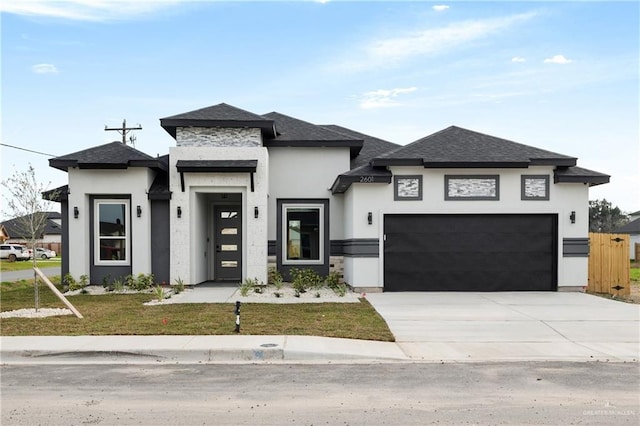 prairie-style home with a garage