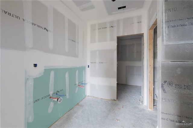 bathroom featuring concrete floors