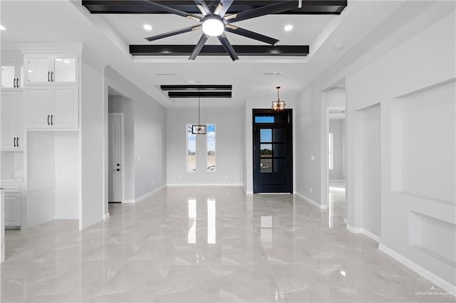 foyer featuring a tray ceiling