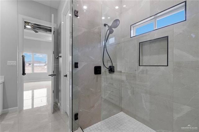 bathroom with a shower with door