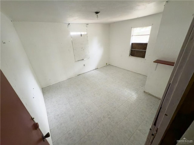 5909 S Kountry Loop, Mission, TX 78574 - empty room with tile patterned floors