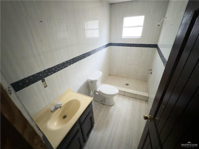 5909 S Kountry Loop, Mission, TX 78574 - full bathroom featuring toilet, a shower stall, and vanity