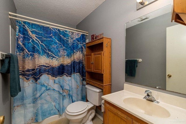 bathroom featuring walk in shower, vanity, a textured ceiling, and toilet