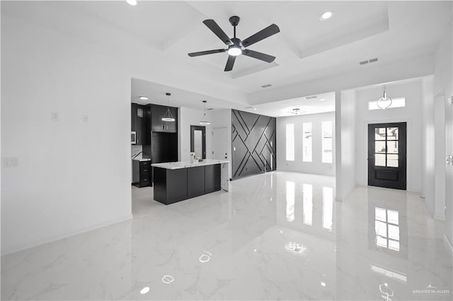 interior space featuring marble finish floor, recessed lighting, visible vents, coffered ceiling, and baseboards