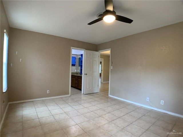 1802 N 17th St, Harlingen, TX 78550 - spare room with ceiling fan and light tile patterned floors
