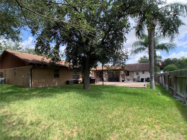 1802 N 17th St, Harlingen, TX 78550 - view of yard featuring a patio