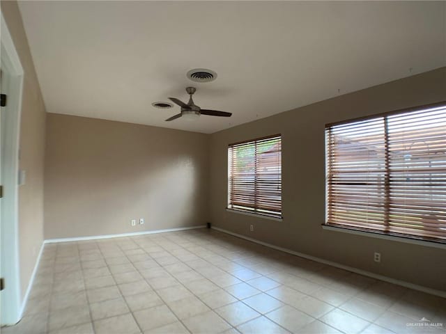 1802 N 17th St, Harlingen, TX 78550 - unfurnished room with a ceiling fan and light tile patterned floors