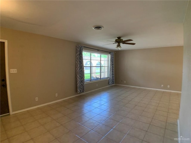 1802 N 17th St, Harlingen, TX 78550 - spare room with a ceiling fan and light tile patterned flooring