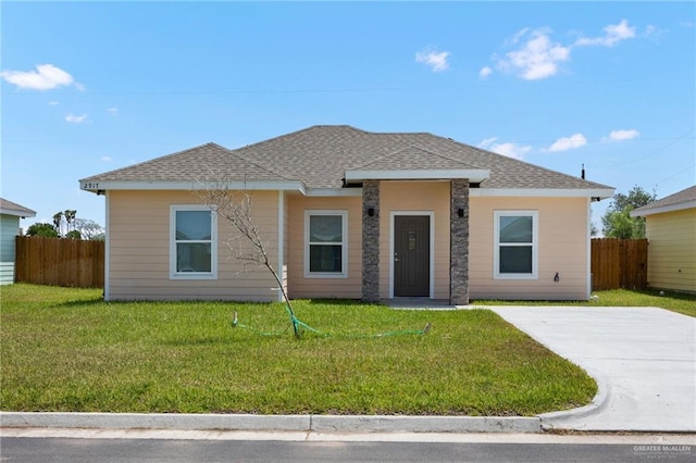 view of front of home with a front lawn