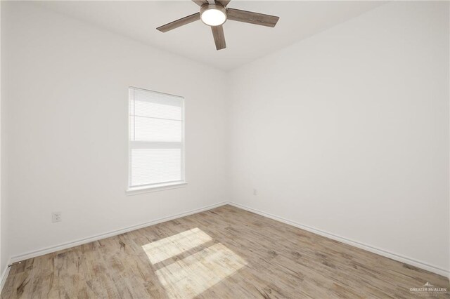 empty room featuring ceiling fan and light hardwood / wood-style floors