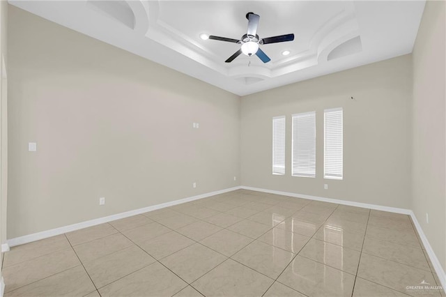 3120 La Puerta Ave, Edinburg, TX 78541 - spare room with a tray ceiling, ceiling fan, recessed lighting, and light tile patterned flooring