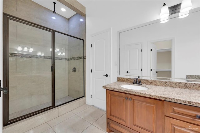 3120 La Puerta Ave, Edinburg, TX 78541 - full bathroom featuring a shower stall, vanity, and tile patterned floors
